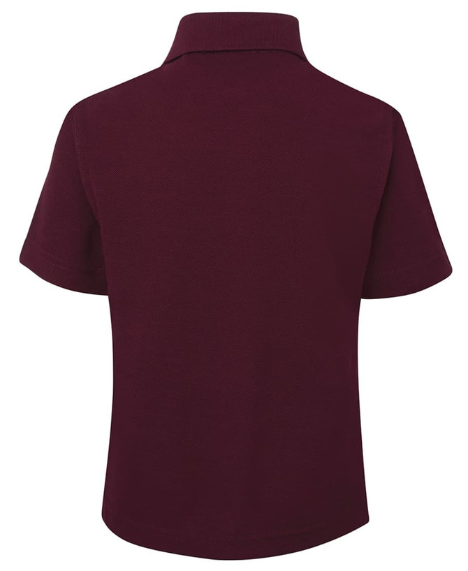 A maroon kids' short-sleeved polo shirt with a collar and an indistinct logo on the back.
