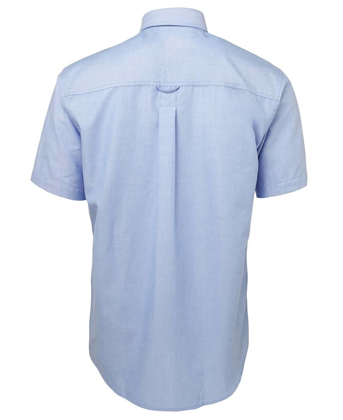 A light blue short-sleeve Oxford shirt with a back pleat and a logo on the label.