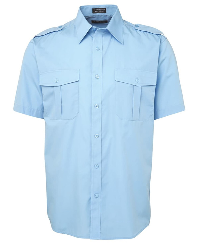 A short-sleeved button-up shirt in light blue with two chest pockets and a logo on the collar.