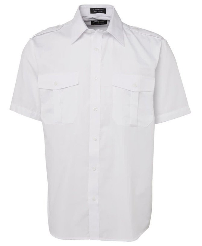 A white button-up shirt featuring two chest pockets and short sleeves. The shirt has a logo on the collar.