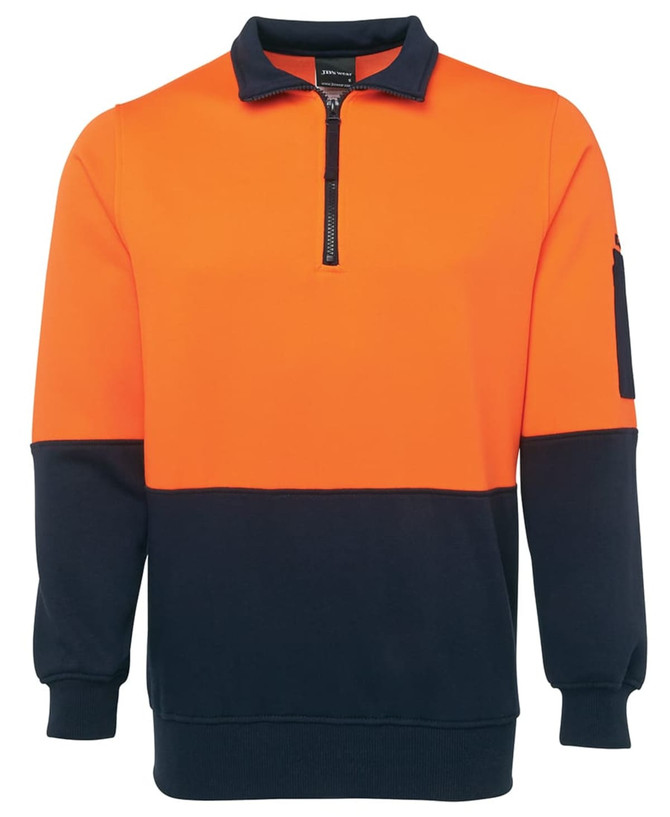 A half-zip fleece jumper in orange and navy blue, featuring a zippered neck and a sleeve pocket.