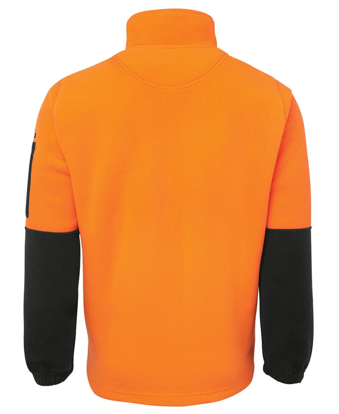 A brightly coloured orange polar fleece jacket with black sleeves and a high collar. It features a logo on the sleeve.