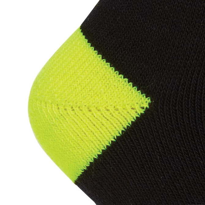 A black sock with a bright yellow reinforced toe, featuring a logo on its side.