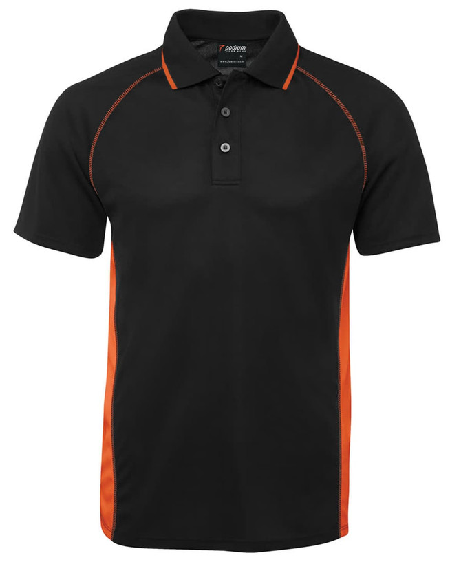 A black polo shirt with orange accents and a collar, featuring buttons and a logo on the label.