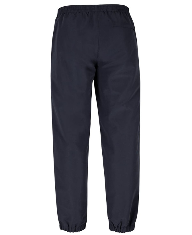 Track pants in dark navy with an elastic waist and cuffs, featuring a back pocket and a logo.