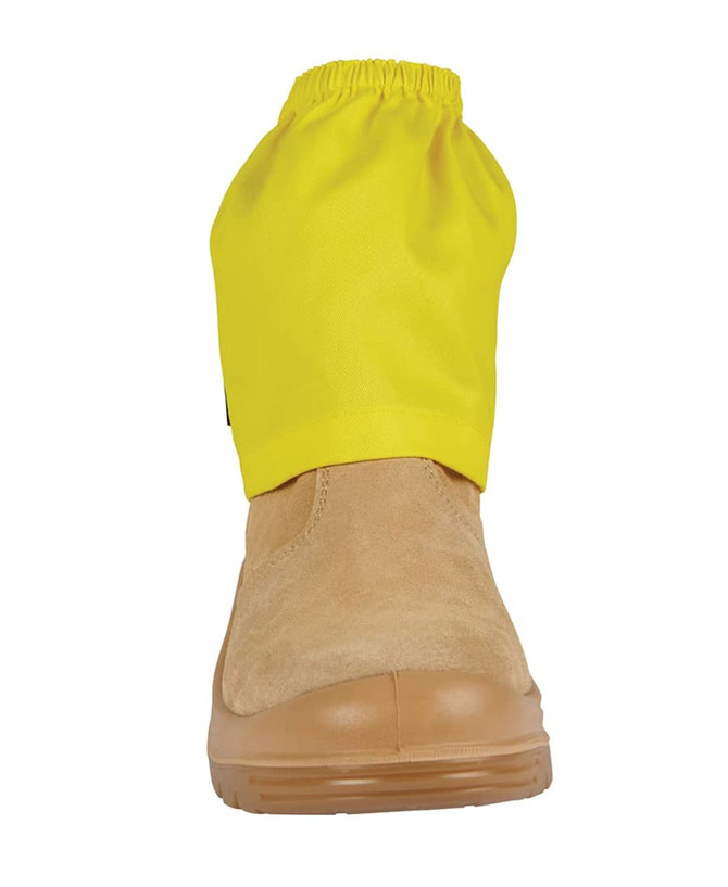 A boot cover in bright yellow fabric, designed to fit over a tan work boot. It has an elasticated top for a secure fit.
