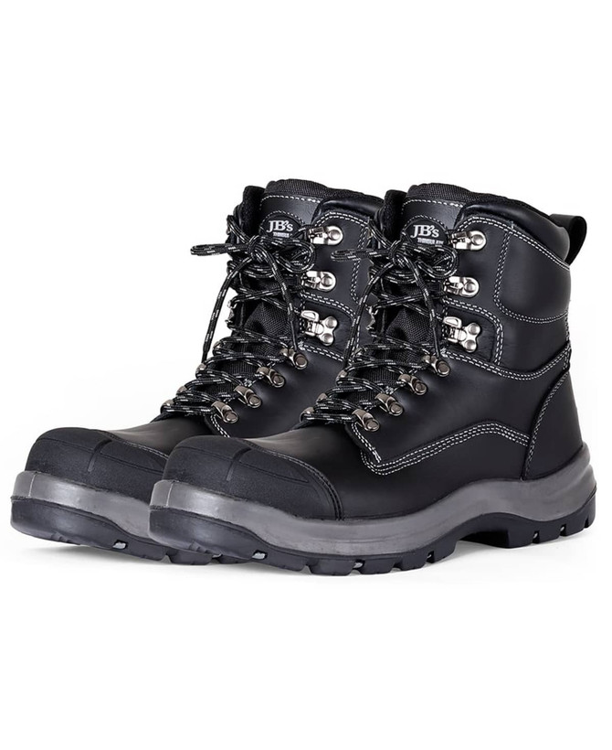 A pair of black waterproof boots with metallic eyelets and reinforced toe caps. Features a logo on the side.