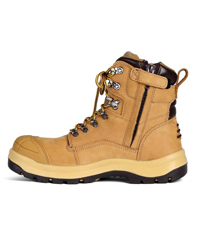A pair of tan Arctic Freezer boots featuring laces, metal eyelets, and a side zipper, with a black logo on the heel.