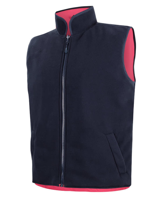 A navy reversible vest with a pink interior and a front zipper, featuring side pockets and a high collar.