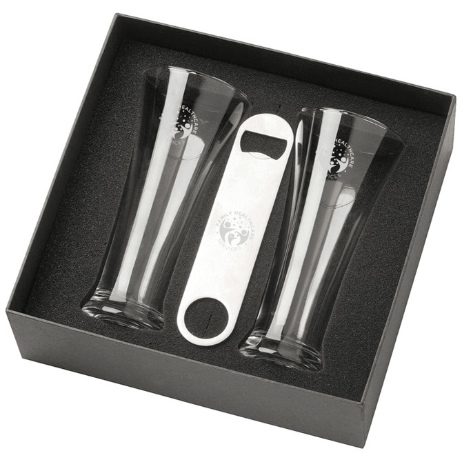 A Pilsner beer glass set featuring two clear glasses and a bottle opener, all presented in a sleek black box.