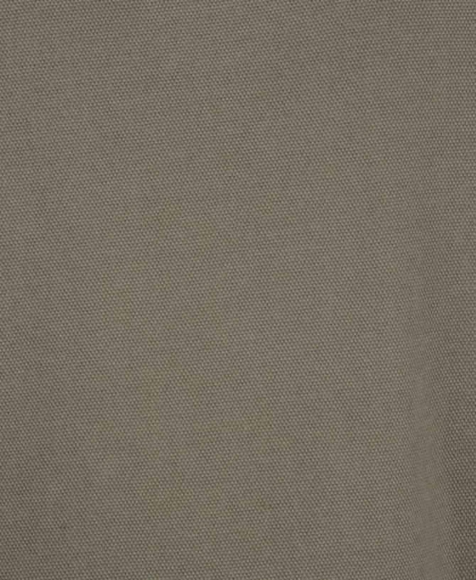 A textured green fabric, close-up, suitable for a polo shirt design. It features a branding logo.