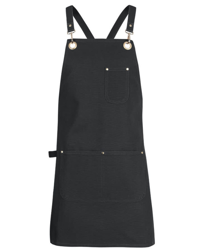 A black canvas apron with brass eyelets and a pocket, featuring adjustable PU straps.