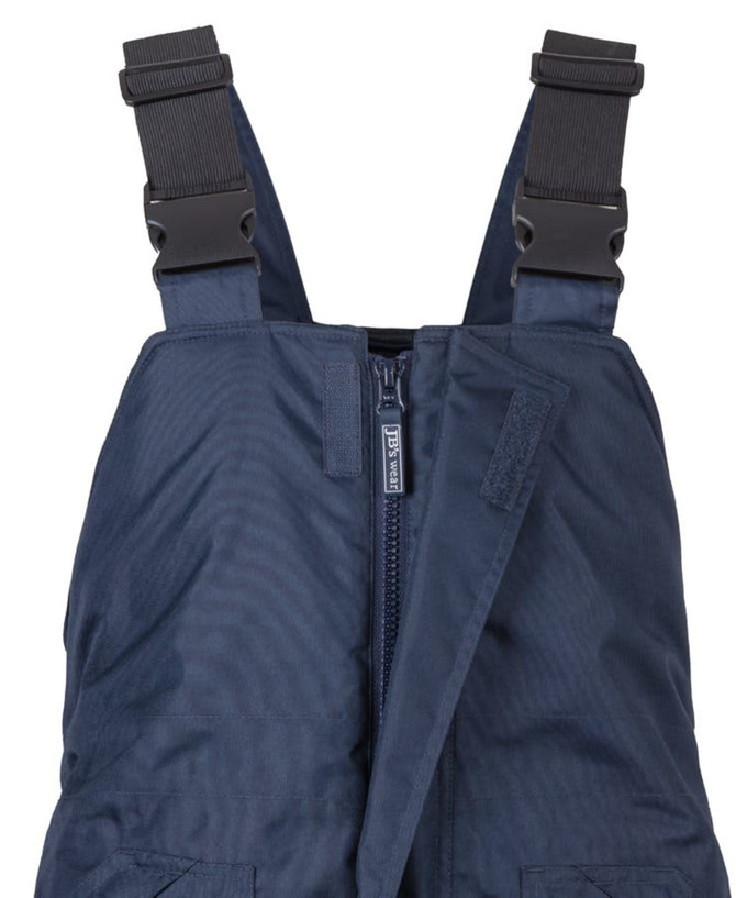 Navy bib and brace with adjustable straps and zippers, featuring lime accents and a logo.