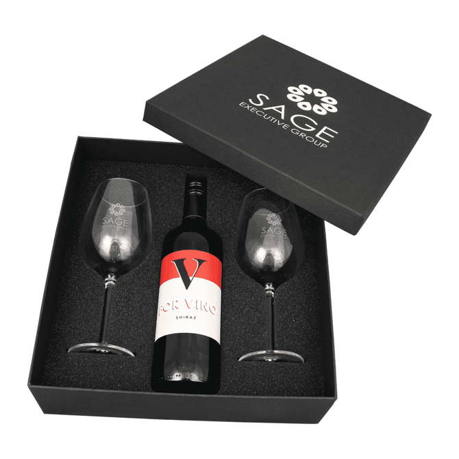 A wine box featuring a bottle of Shiraz and two stemmed glasses, all presented in a black gift box with a logo.