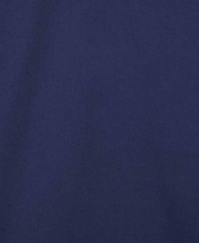 A navy blue fabric close-up featuring a smooth texture, suitable for work shirts and clothing.