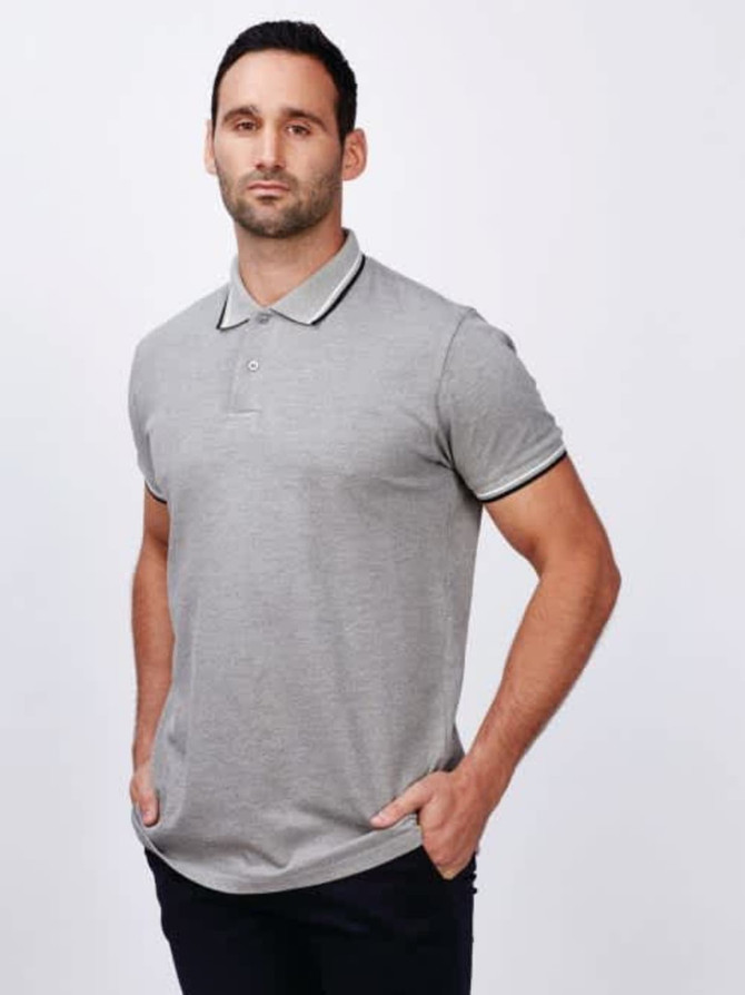 A men's grey polo shirt with contrasting trim and a logo on the chest, styled on a male model.