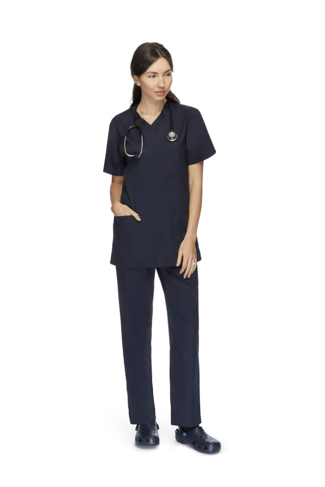 Unisex navy scrubs pants displayed on a model, paired with a matching top and stethoscope.