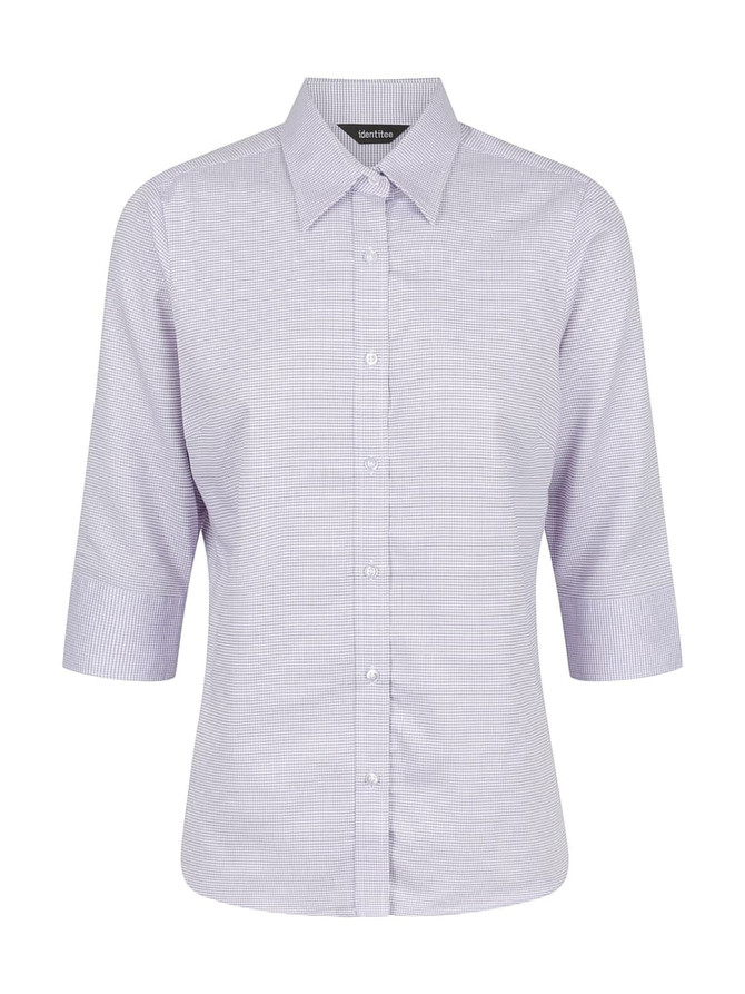 A ladies' 3/4 sleeve button-up shirt in a light purple check pattern, featuring a collar and branding.