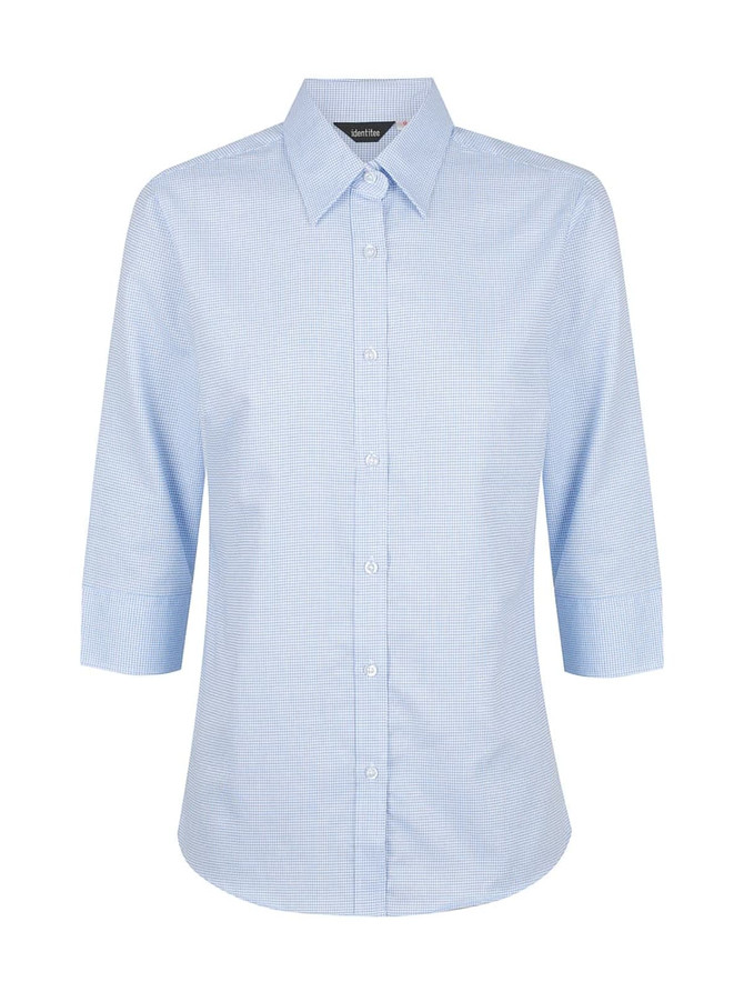 A light blue, button-up shirt with 3/4 sleeves and a collar, featuring a subtle check pattern and a logo.
