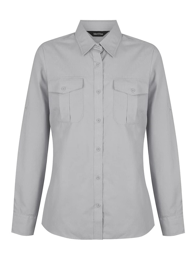 A light grey ladies long sleeve button-up shirt featuring two front pockets and a collar. It has a logo.