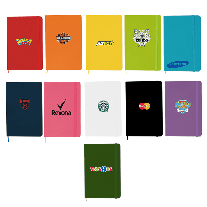 A collection of A5 notebooks in various colours, featuring multiple logos and branding on the covers.