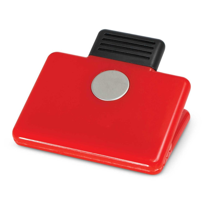 A red magnetic clip with a black handle and a silver circular emblem on the front.