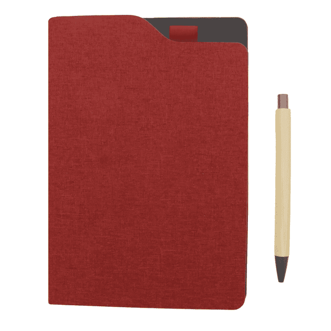 A red A5 notebook with a textured cover and a matching pen beside it. The notebook features a pocket and a ribbon marker.