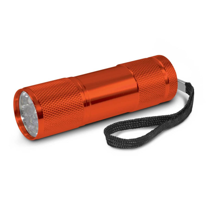 An orange Nebula Torch designed as a compact flashlight, featuring a textured grip and a wrist strap for easy carrying.