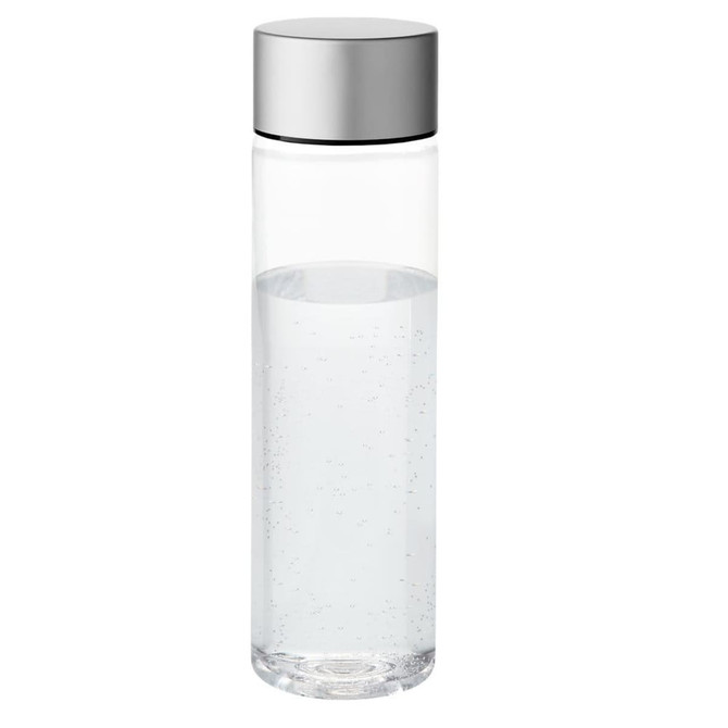 A drink bottle in transparent glass with a silver metallic lid, holding clear water inside.