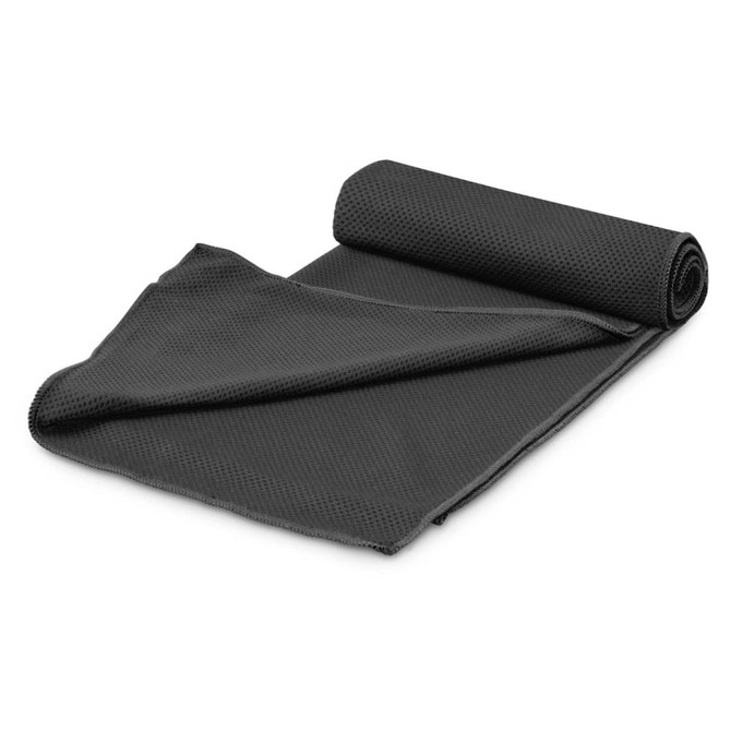 A rolled black cooling towel made of textured fabric, laid out flat. It features a logo on one side.