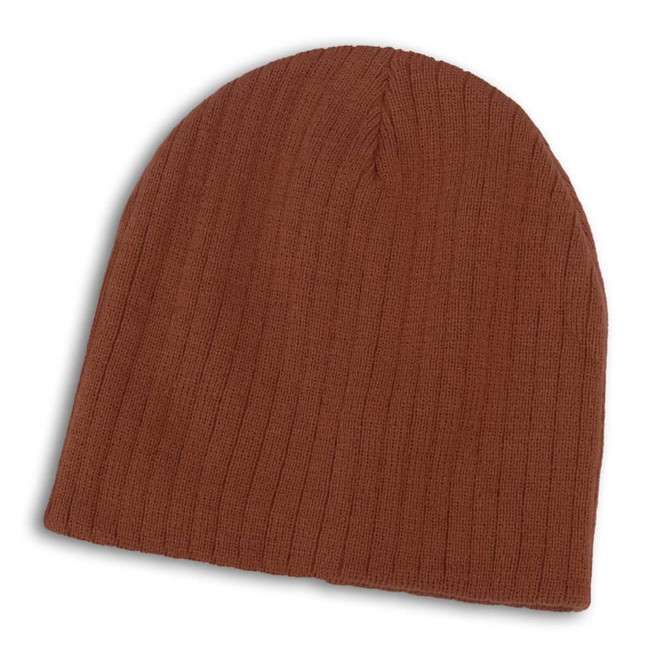 A Nebraska Cable Knit Beanie in a rich brown color with a ribbed texture.