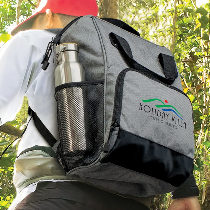 A grey cooler backpack with a drink bottle in the side mesh pocket, featuring a logo on the front.