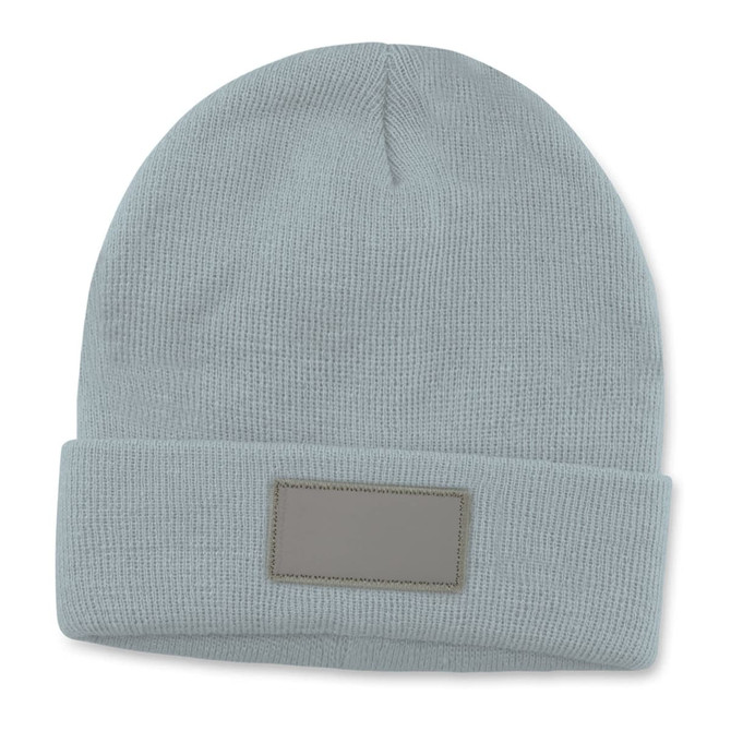 A light blue beanie featuring a fold-over cuff and a blank patch for customization.