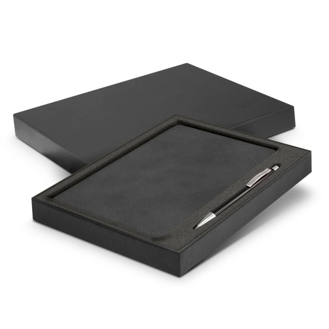 A black gift box containing a black notebook and silver pen, featuring a textured interior.