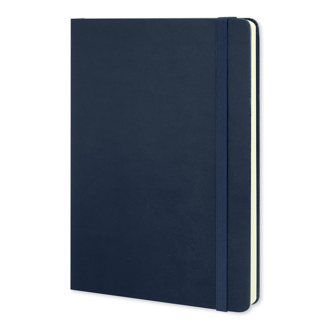 A large Moleskine Classic hard cover notebook in navy blue with an elastic band and rounded edges.