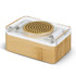 A bamboo wireless speaker with a clear top and cylindrical sound grille, featuring a minimalist design.