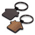A house-shaped key ring featuring a black metal finish and a wooden accent, with a circular keychain attachment.