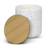 A white candle with a speckled design and a natural bamboo lid.