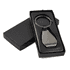 A gunmetal keychain with a bottle opener feature, presented in a black box.