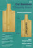 A bamboo chopping board with a smooth surface, featuring a handle and engraved branding, in natural light brown.