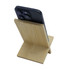 A bamboo phone stand in a natural finish, holding a smartphone at an inclined angle.