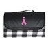 A black and white checkered picnic blanket with a pink ribbon design and a carry handle.