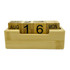 A bamboo perpetual calendar featuring cubed date and month blocks in a natural wood holder.