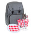 A grey backpack with cutlery, red and white check napkins, plates, and wine glasses. It features a logo.