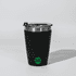 A black tumbler with a stainless steel rim and a lid, featuring a logo on the front.