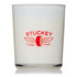 A glass candle with a frosted finish, featuring a red logo and white wax.