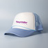A light blue and white trucker cap with a mesh back and a logo on the front.
