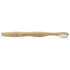 A bamboo toothbrush with a curved handle and white bristles, featuring a logo on the handle.