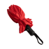 A red umbrella with a black handle, featuring a logo on the handle, secured with a strap.