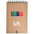 A spiral-bound notebook with a kraft cover featuring a transparent window displaying several colourful markers inside.